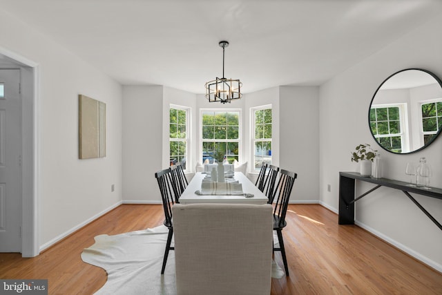 9109 Knox Ct, Laurel, MD 20723 - dining space with a chandelier, light wood-style floors, and baseboards