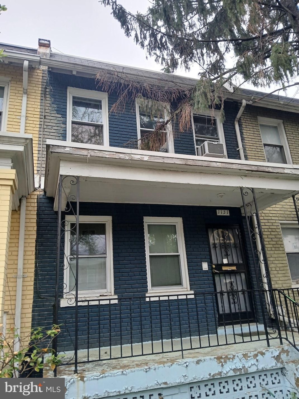 1131 Abbey Pl NE, Washington, DC 20002 - view of front of home featuring covered porch and brick siding