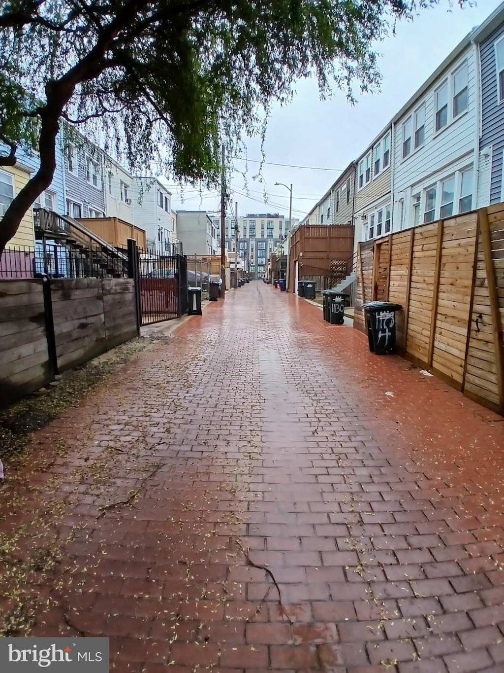 1131 Abbey Pl NE, Washington, DC 20002 - view of decorative alley featuring a gate and street lighting