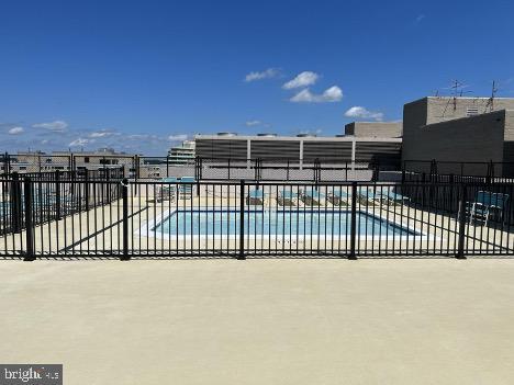 4515 Willard Ave Unit 2309S, Chevy Chase, MD 20815 - community pool featuring a patio area
