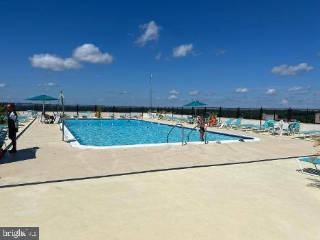 4515 Willard Ave Unit 2309S, Chevy Chase, MD 20815 - community pool with a patio