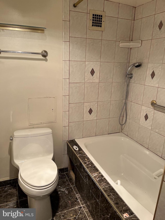 4515 Willard Ave Unit 2309S, Chevy Chase, MD 20815 - full bath with toilet, a whirlpool tub, marble finish floors, and baseboards