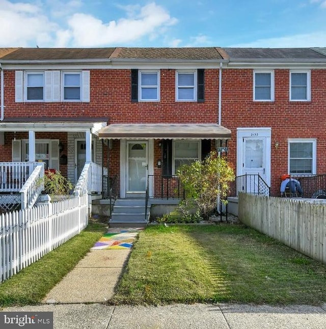 2134 Firethorn Rd, Middle River, MD 21220 - view of property featuring brick siding and a porch