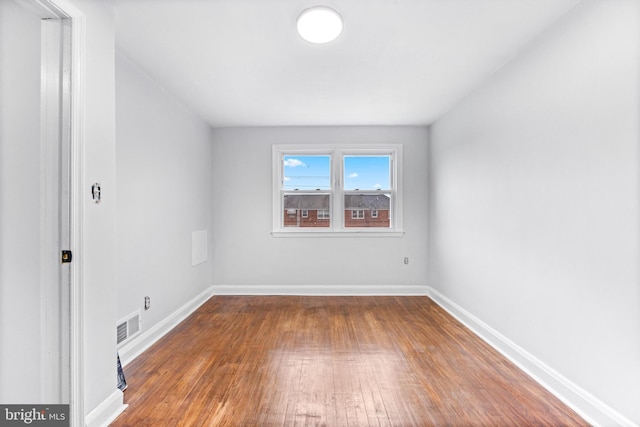 2134 Firethorn Rd, Middle River, MD 21220 - empty room with hardwood / wood-style flooring and baseboards