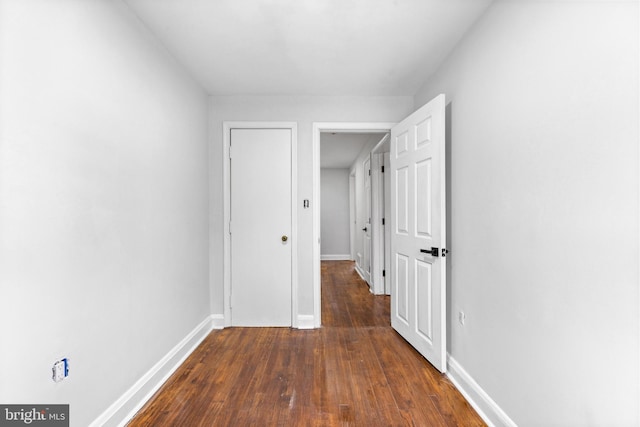 2134 Firethorn Rd, Middle River, MD 21220 - hall featuring dark wood finished floors and baseboards