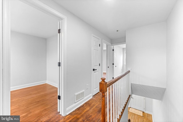 2134 Firethorn Rd, Middle River, MD 21220 - hall with an upstairs landing and wood finished floors
