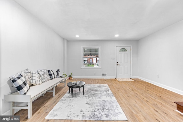 2134 Firethorn Rd, Middle River, MD 21220 - living room featuring light wood finished floors and recessed lighting