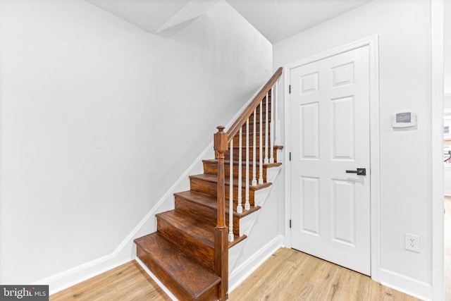 2134 Firethorn Rd, Middle River, MD 21220 - stairs featuring wood finished floors and baseboards