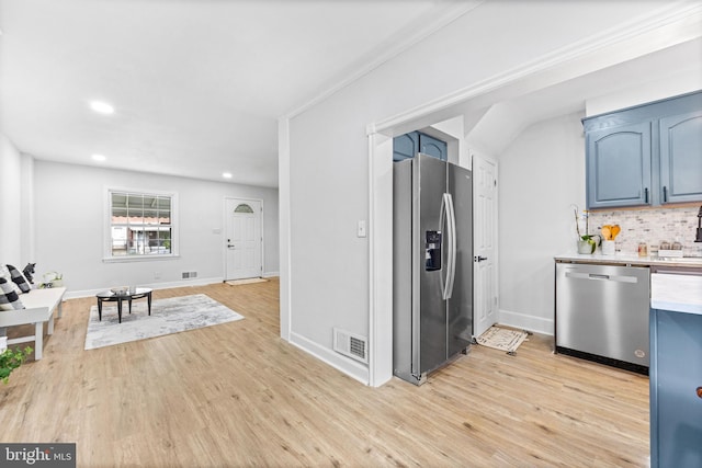 2134 Firethorn Rd, Middle River, MD 21220 - kitchen with appliances with stainless steel finishes, blue cabinetry, light countertops, light wood-style floors, and recessed lighting