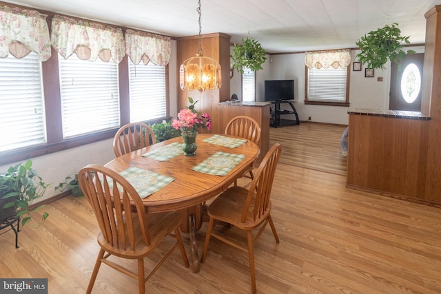 338 E Evergreen Ave, Oaklyn, NJ 08107 - dining area featuring a chandelier, plenty of natural light, and light wood-style flooring