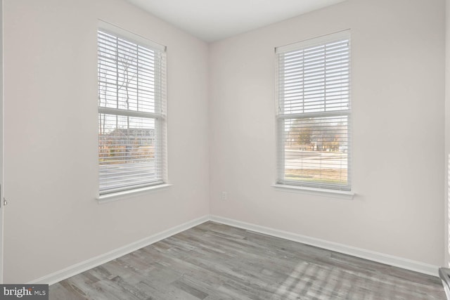 35031 Dundee St Unit 6, Frankford, DE 19945 - empty room with wood finished floors and baseboards