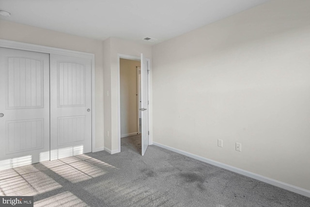 35031 Dundee St Unit 6, Frankford, DE 19945 - unfurnished bedroom with carpet floors, baseboards, and a closet