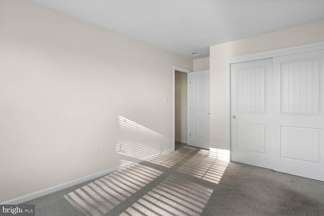 35031 Dundee St Unit 6, Frankford, DE 19945 - unfurnished bedroom with carpet floors, a closet, and baseboards