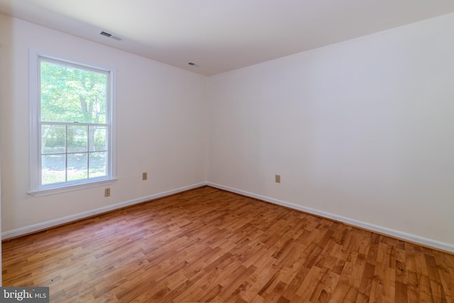 18552 Three Notch Rd, Lexington Park, MD 20653 - unfurnished room featuring light wood-style floors, baseboards, and healthy amount of natural light