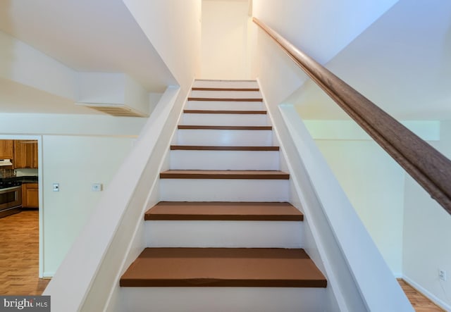 18552 Three Notch Rd, Lexington Park, MD 20653 - stairway featuring wood finished floors