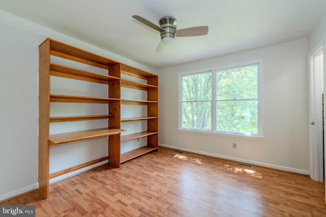 18552 Three Notch Rd, Lexington Park, MD 20653 - empty room with light wood-type flooring, a ceiling fan, and baseboards