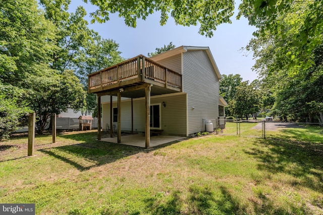 18552 Three Notch Rd, Lexington Park, MD 20653 - rear view of property featuring a gate, a patio area, and a deck