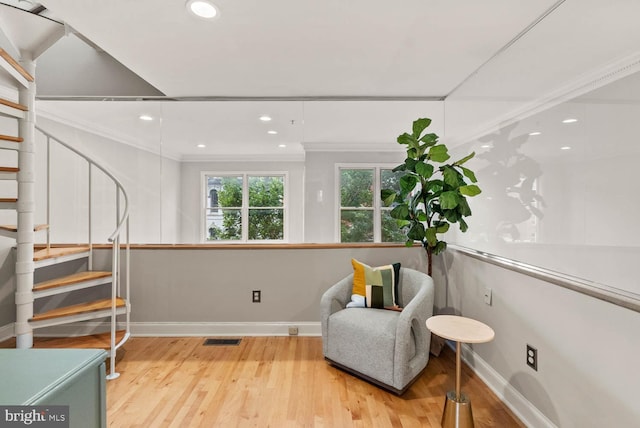 1406 Corcoran St NW Unit D, Washington, DC 20009 - sitting room with ornamental molding, wood finished floors, stairway, and recessed lighting