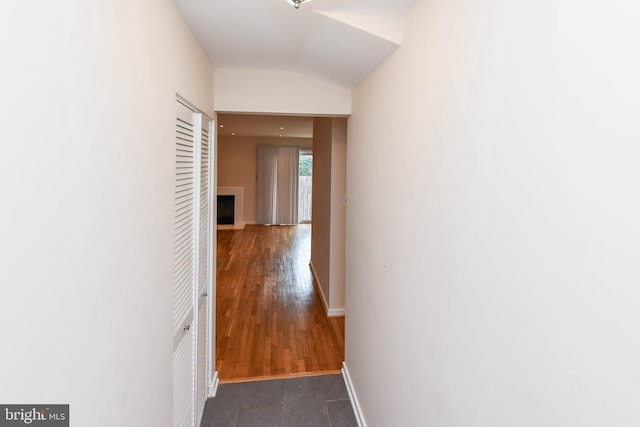 49 Hawthorne Ct NE Unit 49, Washington, DC 20017 - corridor with vaulted ceiling and baseboards