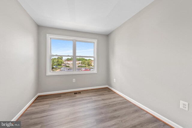10779 Primrose Ct, Manassas, VA 20109 - unfurnished room with wood finished floors and baseboards