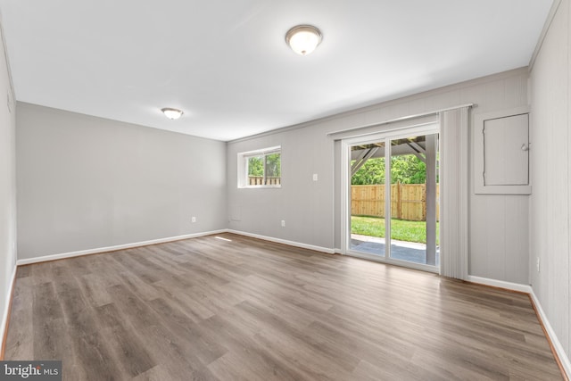 10779 Primrose Ct, Manassas, VA 20109 - unfurnished room with baseboards and wood finished floors