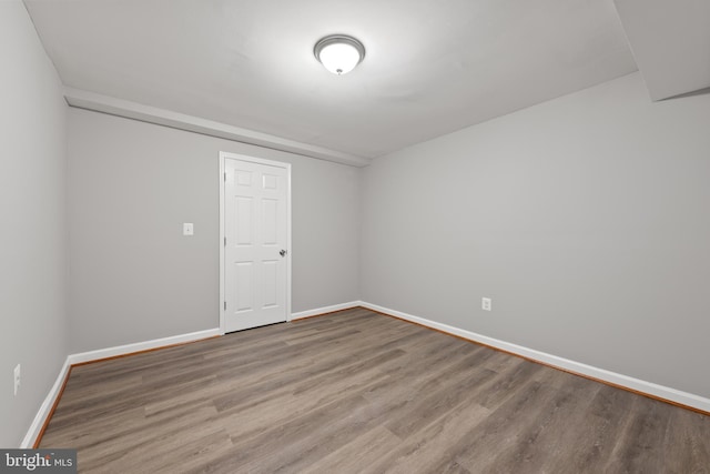 10779 Primrose Ct, Manassas, VA 20109 - unfurnished room with wood finished floors and baseboards