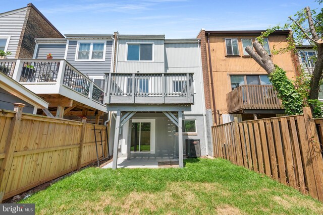 10779 Primrose Ct, Manassas, VA 20109 - back of property with a patio, a wooden deck, and cooling unit