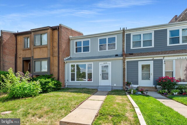10779 Primrose Ct, Manassas, VA 20109 - multi unit property with a front lawn and entry steps