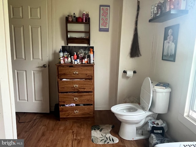 619-621 Riverside Dr, Lewistown, PA 17044 - half bath featuring toilet and wood finished floors