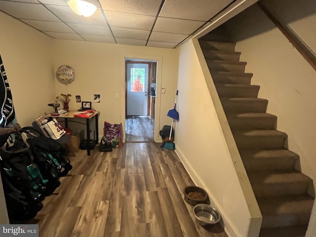 619-621 Riverside Dr, Lewistown, PA 17044 - interior space with stairs, wood finished floors, a drop ceiling, and baseboards