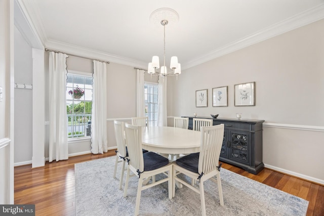 31 Bramley Rd, Moorestown, NJ 08057 - dining area with a chandelier, crown molding, wood finished floors, and baseboards