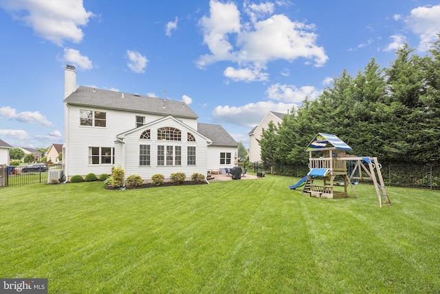 31 Bramley Rd, Moorestown, NJ 08057 - rear view of house featuring a playground, a patio, a chimney, and cooling unit