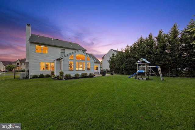 31 Bramley Rd, Moorestown, NJ 08057 - rear view of house with a playground, a chimney, and central AC unit