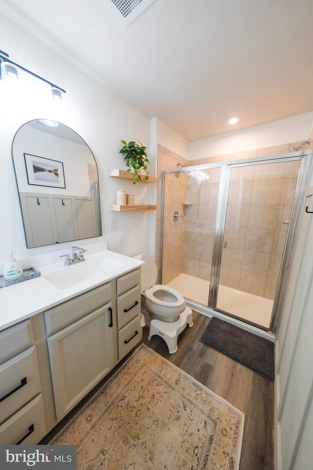 159 Nathan Dr, Cinnaminson, NJ 08077 - full bathroom featuring vanity, wood finished floors, and a stall shower