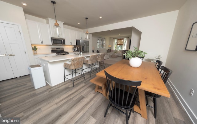 159 Nathan Dr, Cinnaminson, NJ 08077 - dining area featuring light wood-type flooring and recessed lighting