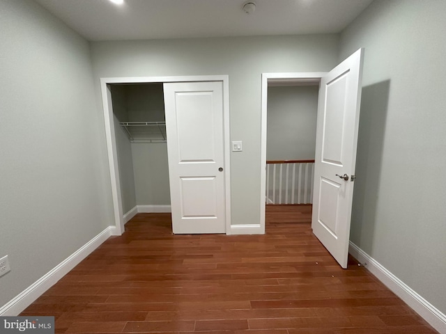 916 Snyder Ave, Philadelphia, PA 19148 - unfurnished bedroom with wood finished floors, a closet, and baseboards