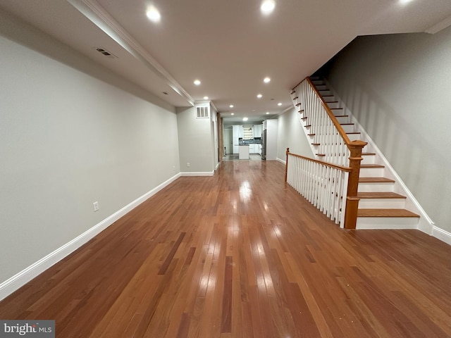 916 Snyder Ave, Philadelphia, PA 19148 - unfurnished living room featuring baseboards, hardwood / wood-style floors, stairway, and recessed lighting