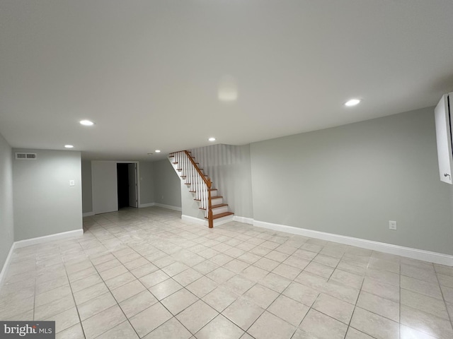 916 Snyder Ave, Philadelphia, PA 19148 - finished below grade area with recessed lighting, stairs, baseboards, and light tile patterned floors