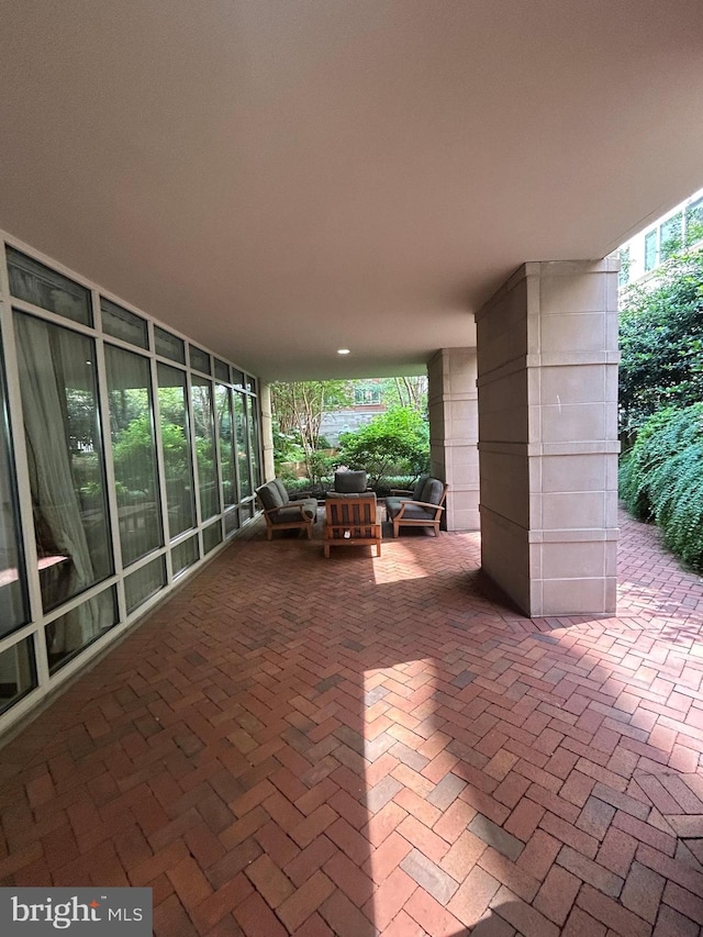 820 N Pollard St Unit 413, Arlington, VA 22203 - view of patio featuring an outdoor living space