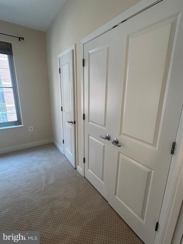 820 N Pollard St Unit 413, Arlington, VA 22203 - hallway with carpet and baseboards