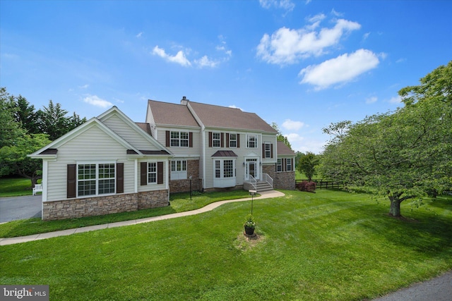 17760 Julie Ann Ct, Hamilton, VA 20158 - view of front of home with stone siding, a front lawn, entry steps, and a chimney