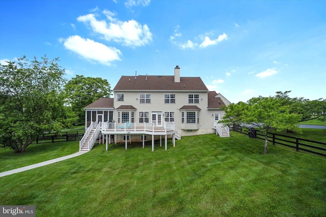 17760 Julie Ann Ct, Hamilton, VA 20158 - back of house featuring stairs, a sunroom, a deck, and a chimney