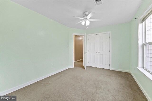 17760 Julie Ann Ct, Hamilton, VA 20158 - unfurnished bedroom featuring carpet flooring, a closet, baseboards, and ceiling fan