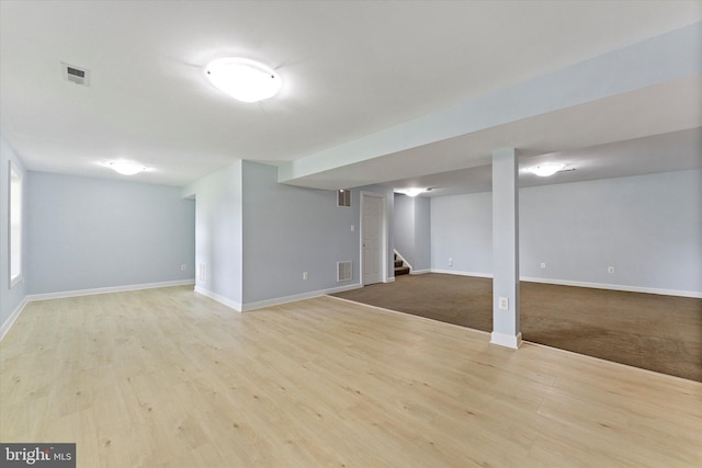 17760 Julie Ann Ct, Hamilton, VA 20158 - finished below grade area featuring stairway, wood finished floors, and baseboards