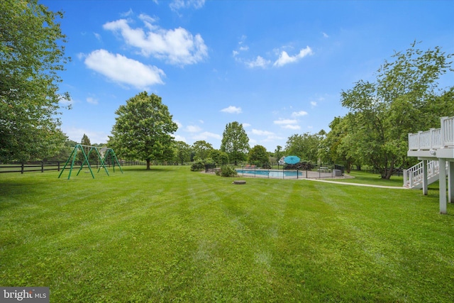 17760 Julie Ann Ct, Hamilton, VA 20158 - view of yard featuring an outdoor pool, stairs, and a deck