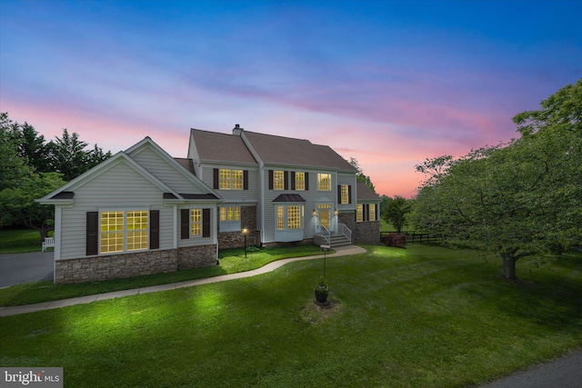 17760 Julie Ann Ct, Hamilton, VA 20158 - view of front of house with stone siding, a yard, and a chimney