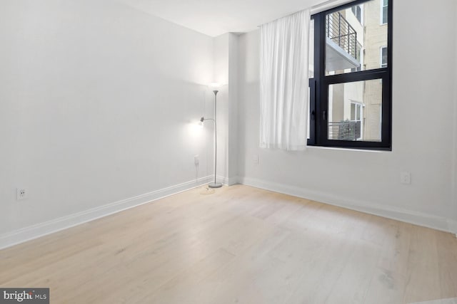 1427 Rhode Island Ave NW Unit 202, Washington, DC 20005 - spare room featuring wood finished floors and baseboards