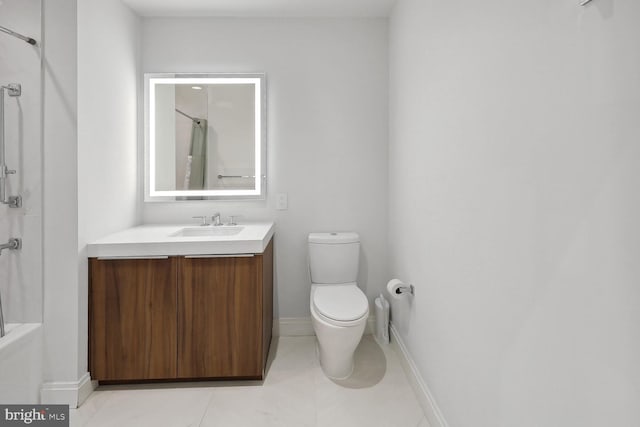 1427 Rhode Island Ave NW Unit 202, Washington, DC 20005 - bathroom featuring a shower, toilet, vanity, tile patterned floors, and baseboards