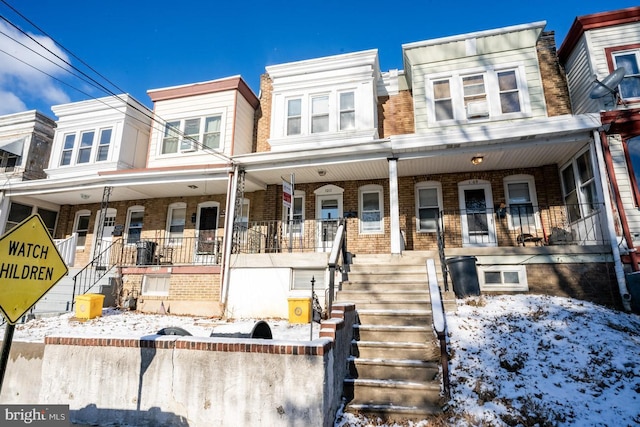 1011 Andrews Ave, Darby, PA 19023 - multi unit property with a porch, brick siding, and stairs