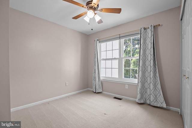 13 Honey Locust Ln, Newtown, PA 18940 - carpeted empty room with baseboards and ceiling fan